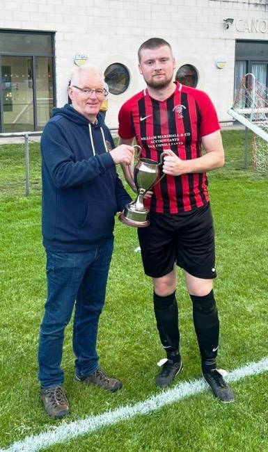 Brian Morris presents John Bailey Memeorial Cup to Goodwick skipper Scott Delaney